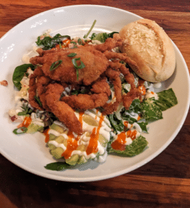 Antique Shopping in Central Kentucky Day 3 lunch stop at Carsons. Soft Shell Crab Salad on white plate