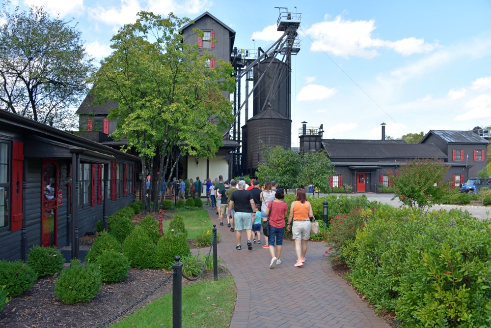 People walking into the Makers Mark Bourbon Distillery in Loretto, Kentucky