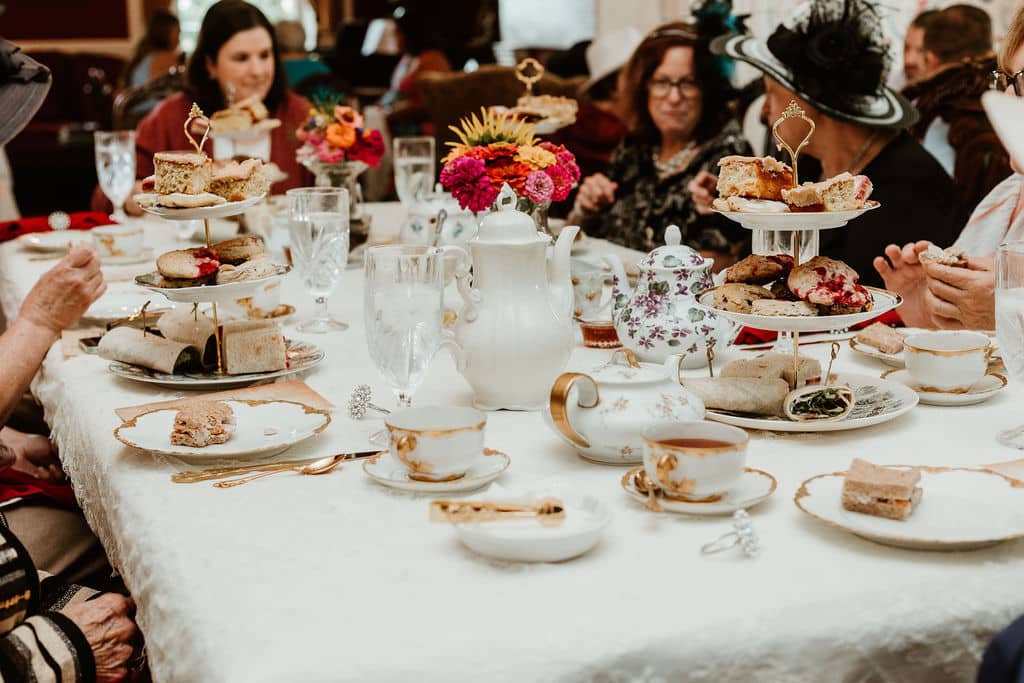 Linen table set with china for afternoon tea party
