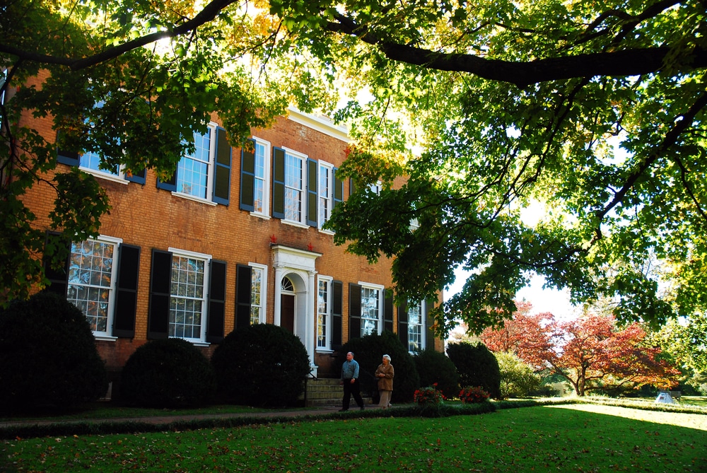 Federal Hill, said to be the inspiration for the Stephen Foster Song My Ol Kentucky Home, stands in a state park outside of Bardstown, Kentucky. Plan ahead for the best fall in Kentucky.